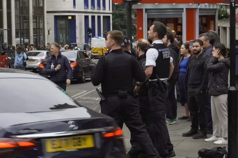 Scientology protestors handcuffed by Police outside Mission Impossible premiere